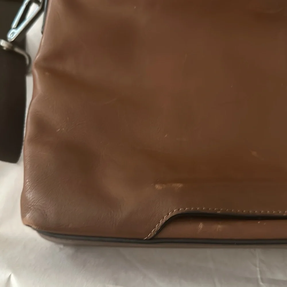 TUMI; Brown Leather Expandable Laptop Bag.